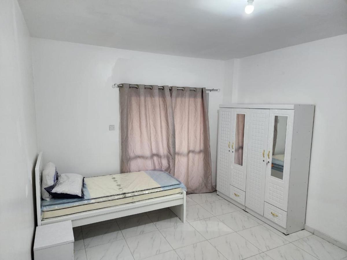 Sharing Motel Rooms Αμπού Ντάμπι Εξωτερικό φωτογραφία